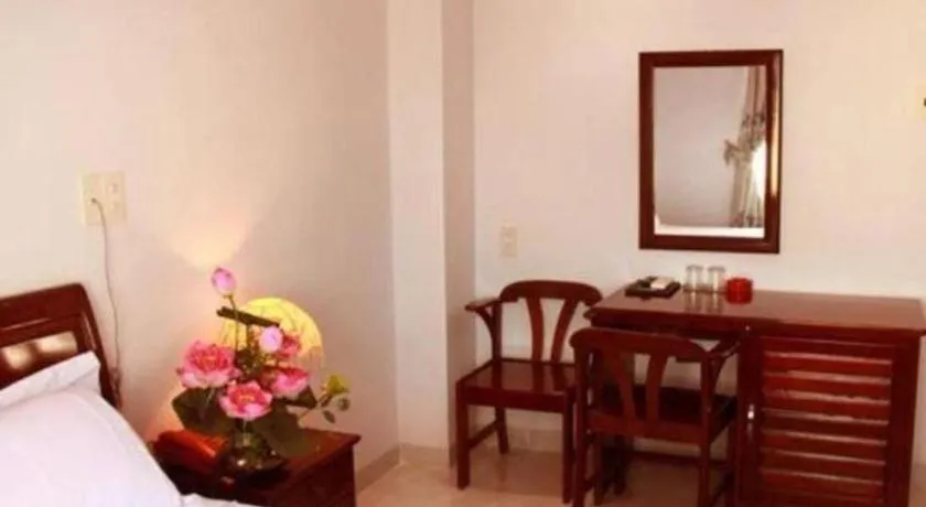 Bed in Nhatrang Cozy Hotel