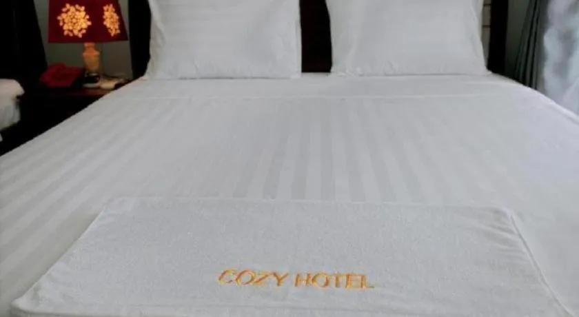 Bed in Nhatrang Cozy Hotel