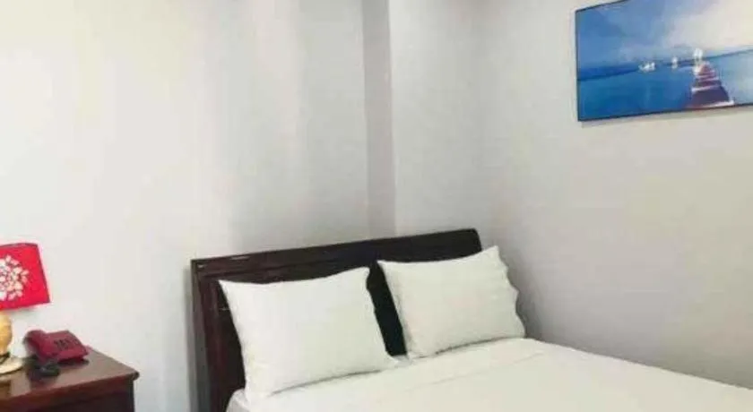 Bed in Nhatrang Cozy Hotel