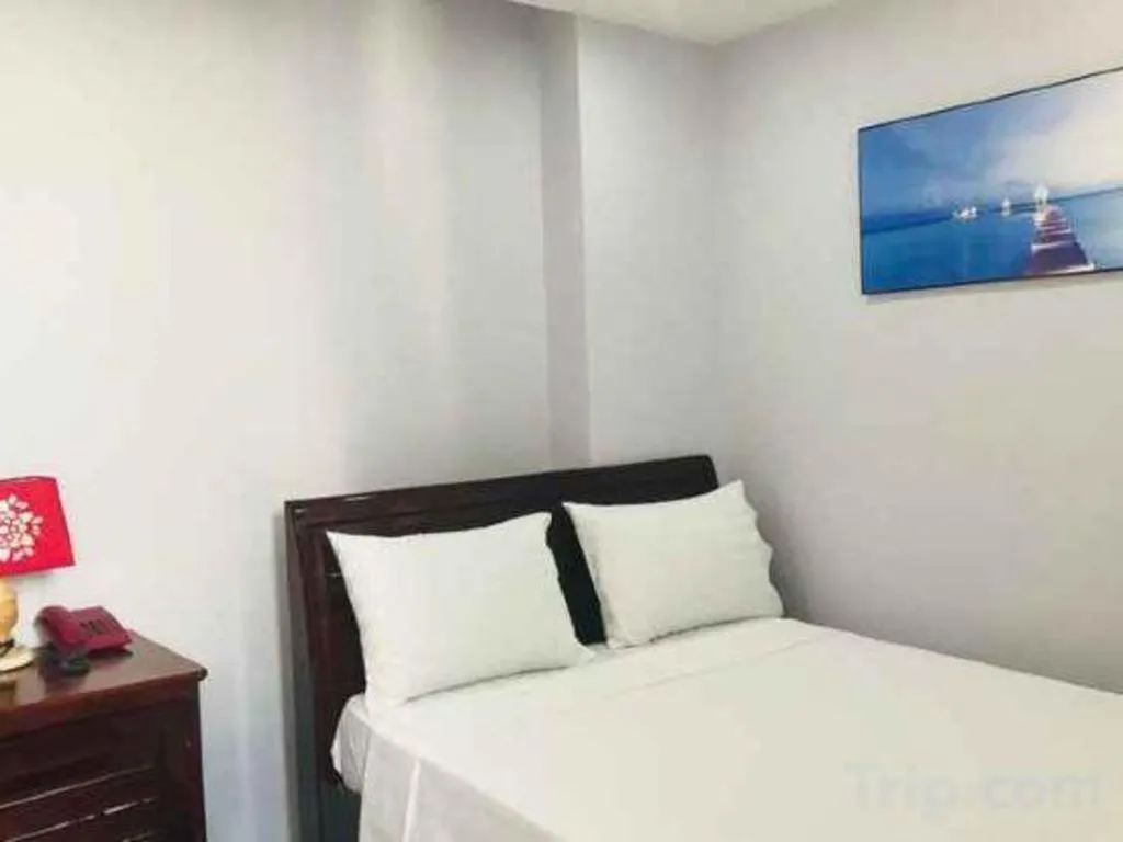 Bed in Nhatrang Cozy Hotel