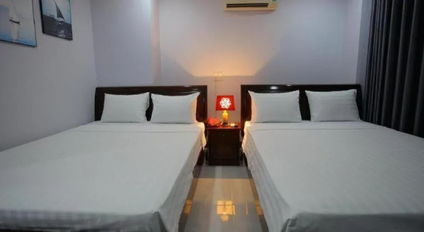 Bed in Nhatrang Cozy Hotel