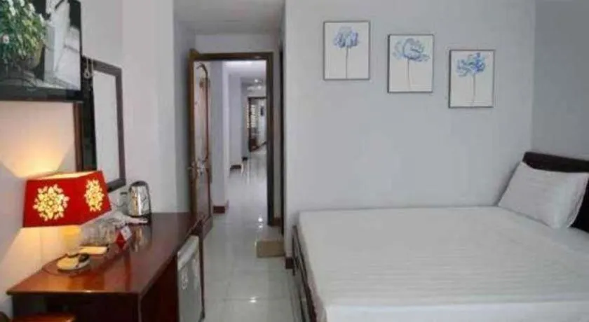 Bed in Nhatrang Cozy Hotel