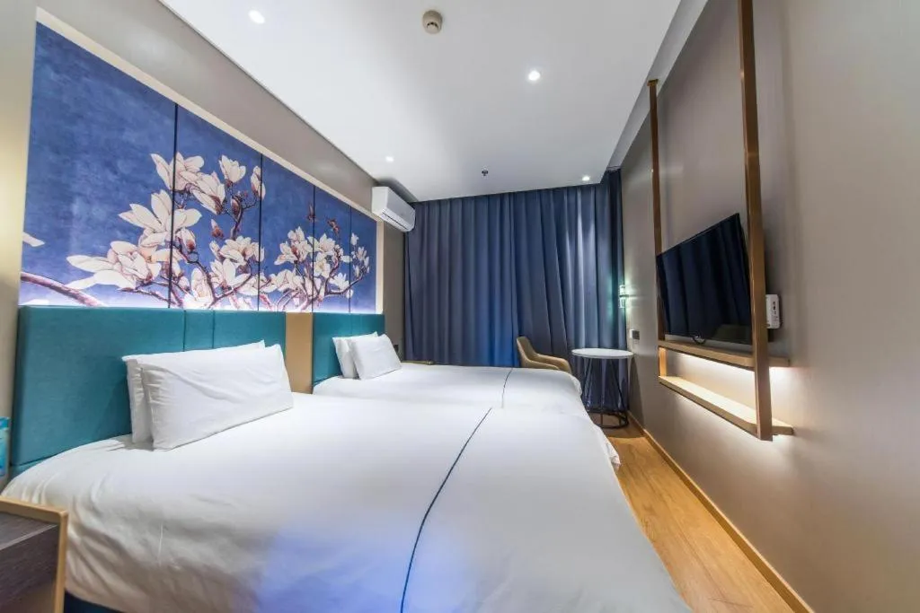 Bed in Jinjiang Inn Jinan Shimao Kuanhouli Quancheng Road