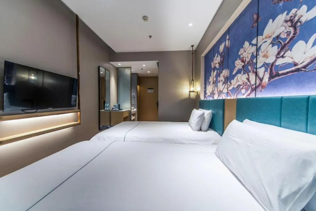 Bed in Jinjiang Inn Jinan Shimao Kuanhouli Quancheng Road