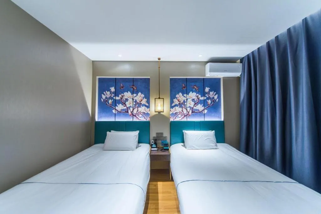 Bed in Jinjiang Inn Jinan Shimao Kuanhouli Quancheng Road