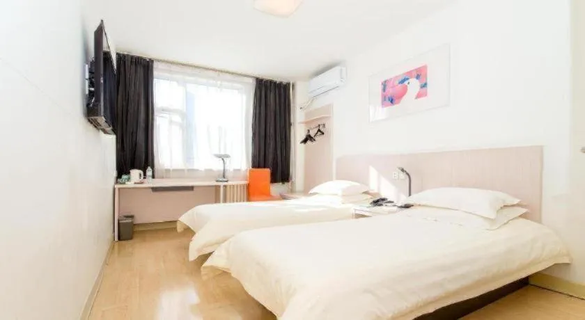 Bed in Jinjiang Inn Jinan Shimao Kuanhouli Quancheng Road