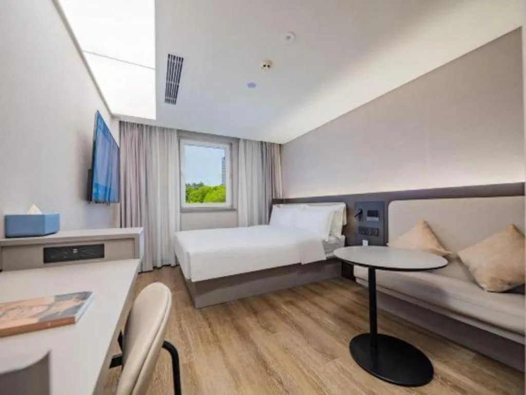 Bed in Ibis Chengdu Yongfeng Hotel