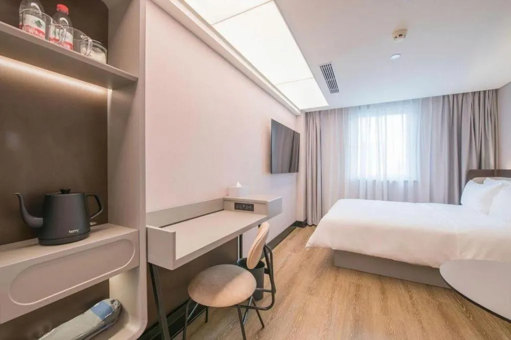 Bed in Ibis Chengdu Yongfeng Hotel