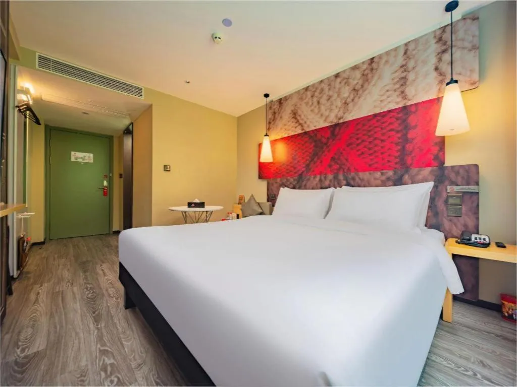 Bed in Ibis Chengdu Yongfeng Hotel