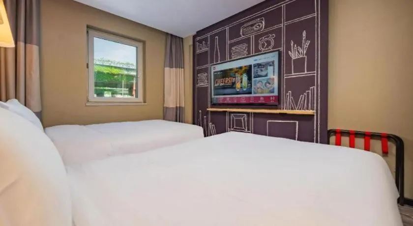 Bed in Ibis Chengdu Yongfeng Hotel
