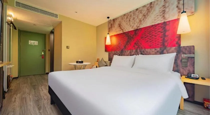 Bed in Ibis Chengdu Yongfeng Hotel