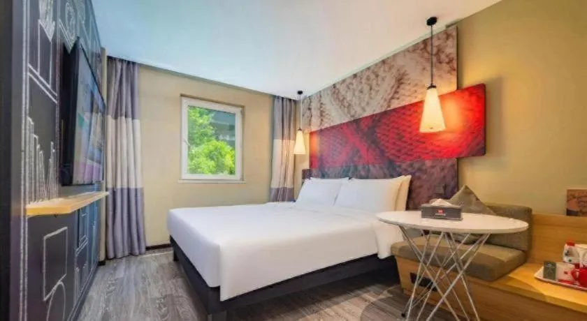 Bed in Ibis Chengdu Yongfeng Hotel
