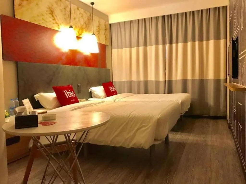 Bed in Ibis Chengdu Kehua Hotel
