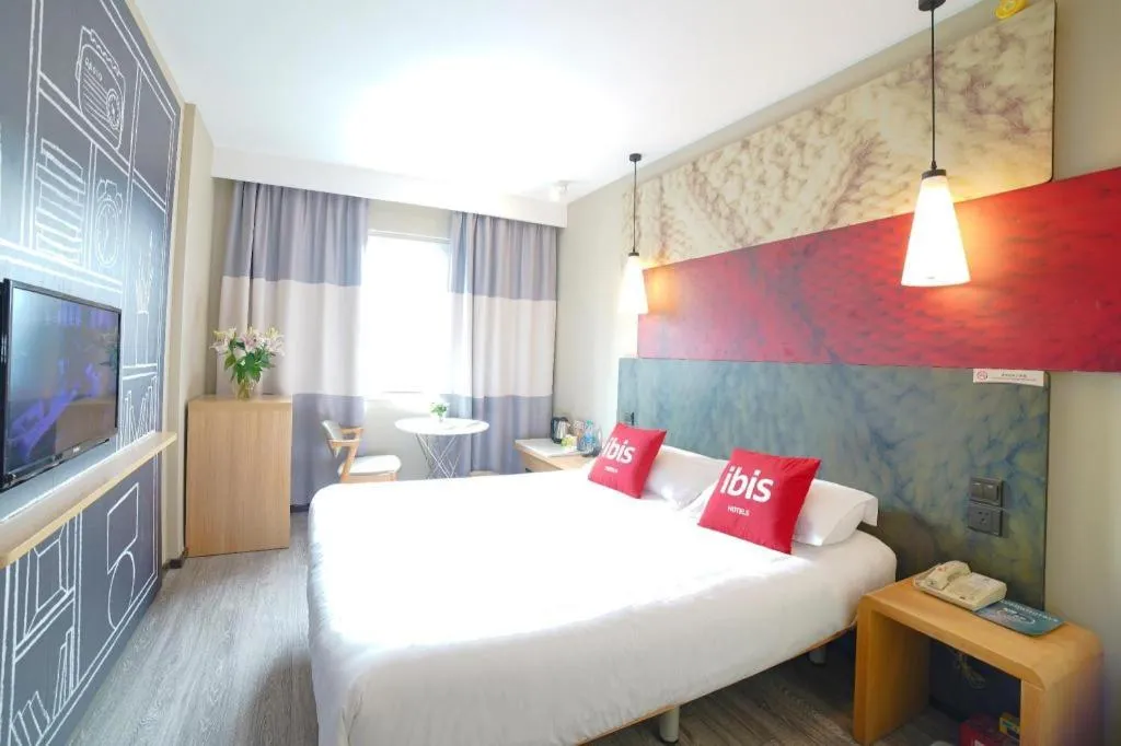 Bed in Ibis Chengdu Kehua Hotel