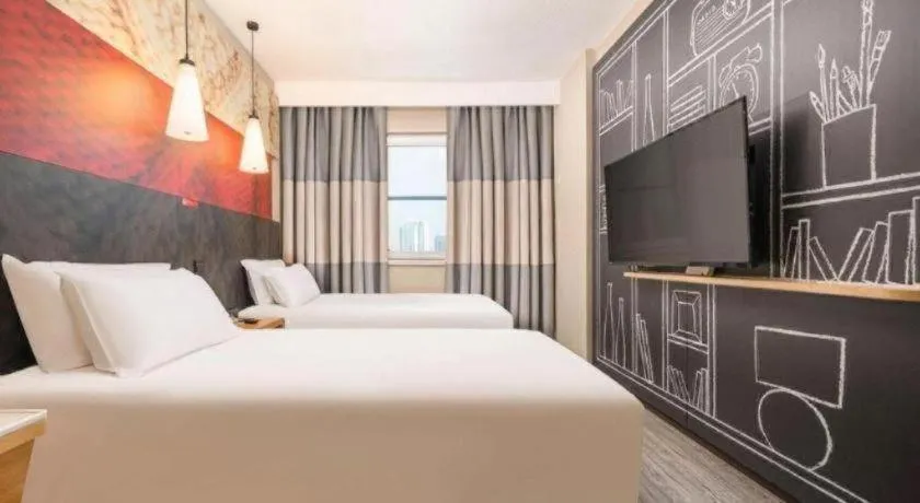 Bed in Ibis Chengdu Kehua Hotel