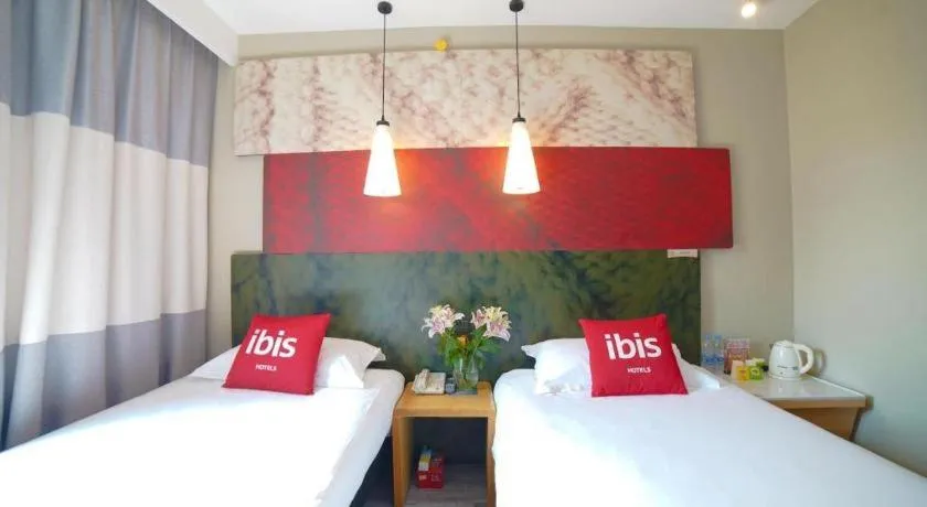 Bed in Ibis Chengdu Kehua Hotel