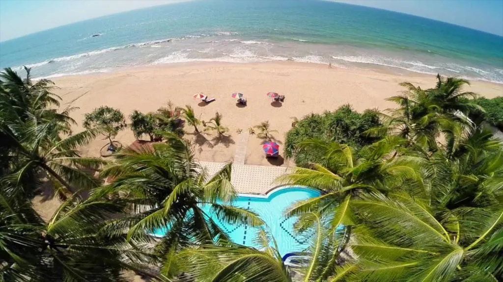 Whispering Palms Hotel