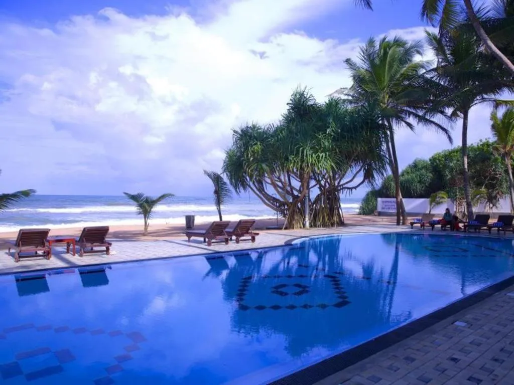 Whispering Palms Hotel