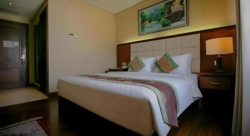 Bed in Grand Qin Hotel Syariah