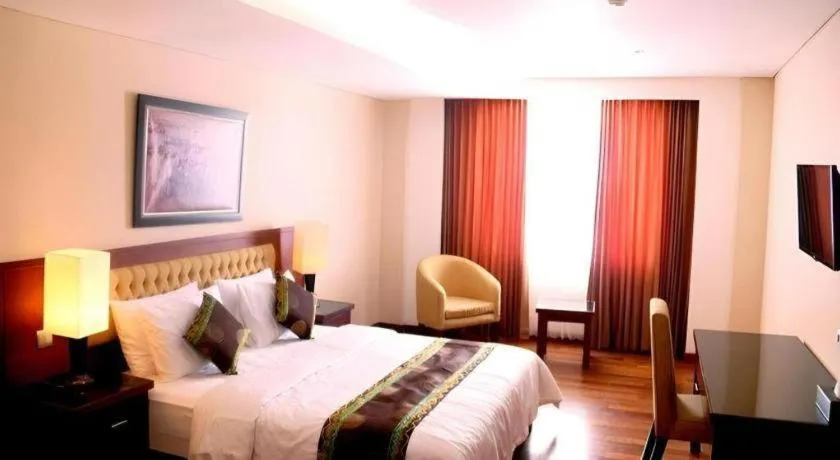 Bed in Grand Qin Hotel Syariah