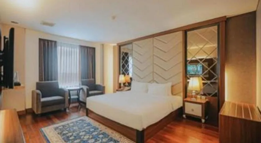 Bed in Grand Qin Hotel Syariah