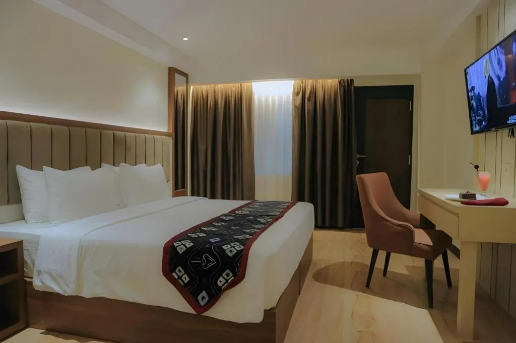 Bed in Grand Qin Hotel Syariah