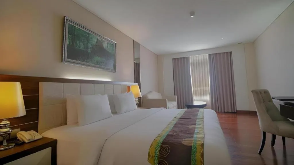 Bed in Grand Qin Hotel Syariah