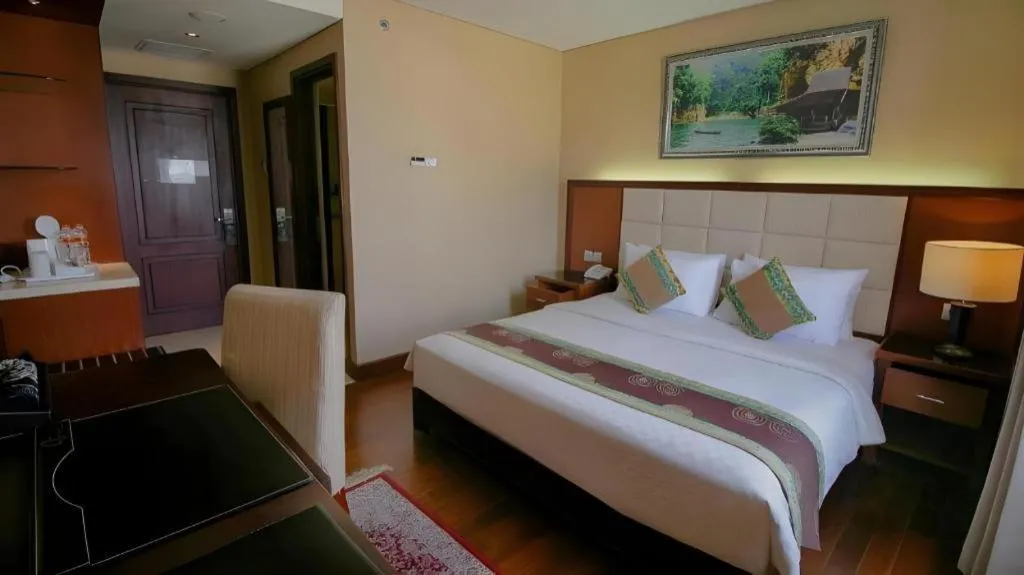 Bed in Grand Qin Hotel Syariah