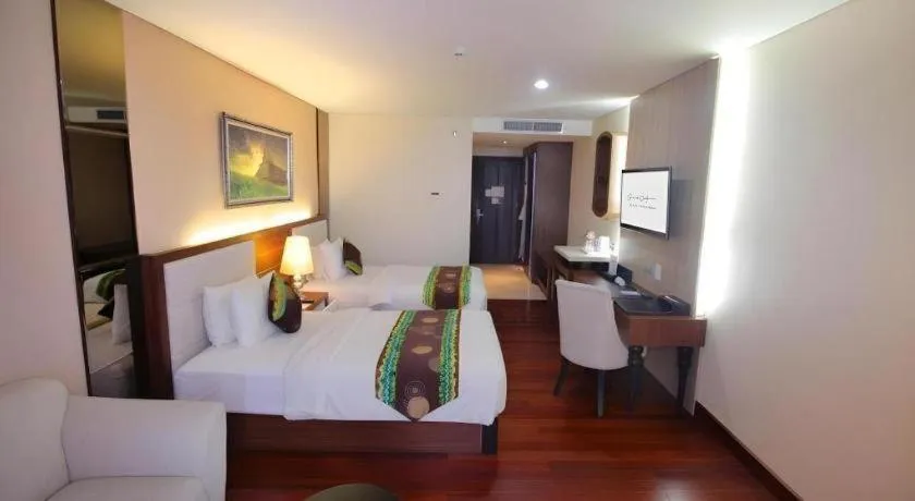 Bed in Grand Qin Hotel Syariah