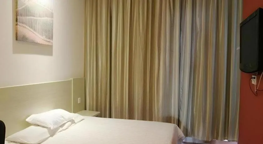 Bed in Hanting Hotel Wuxi Taihu Lake Plaza Branch