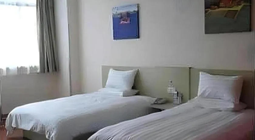 Bed in Hanting Hotel Wuxi Taihu Lake Plaza Branch