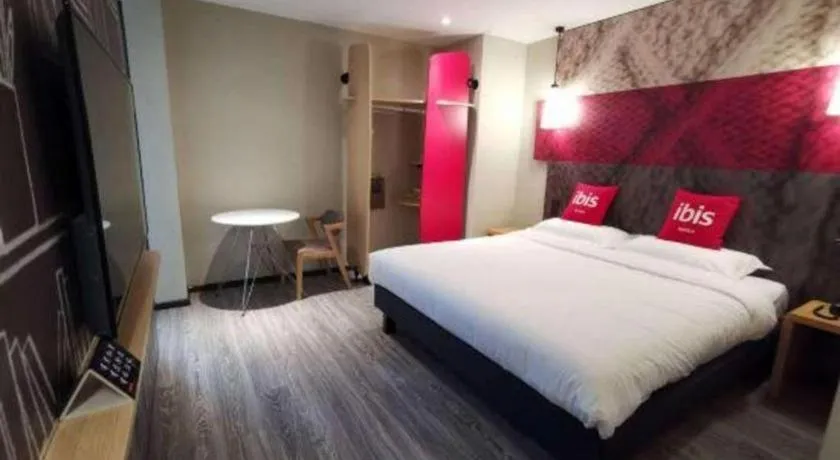 Bed in Hanting Hotel Wuxi Taihu Lake Plaza Branch