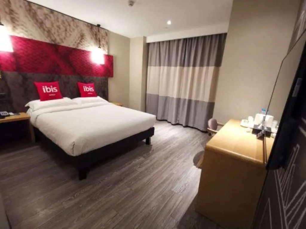 Bed in Hanting Hotel Wuxi Taihu Lake Plaza Branch