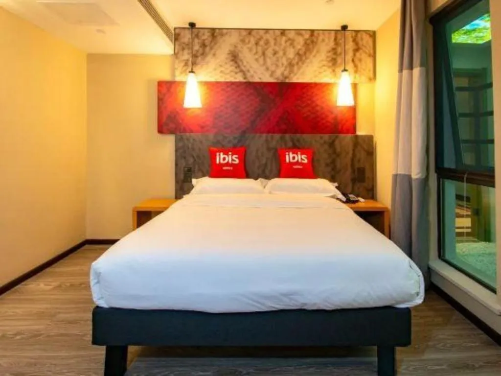 Bed in Hanting Hotel Wuxi Taihu Lake Plaza Branch