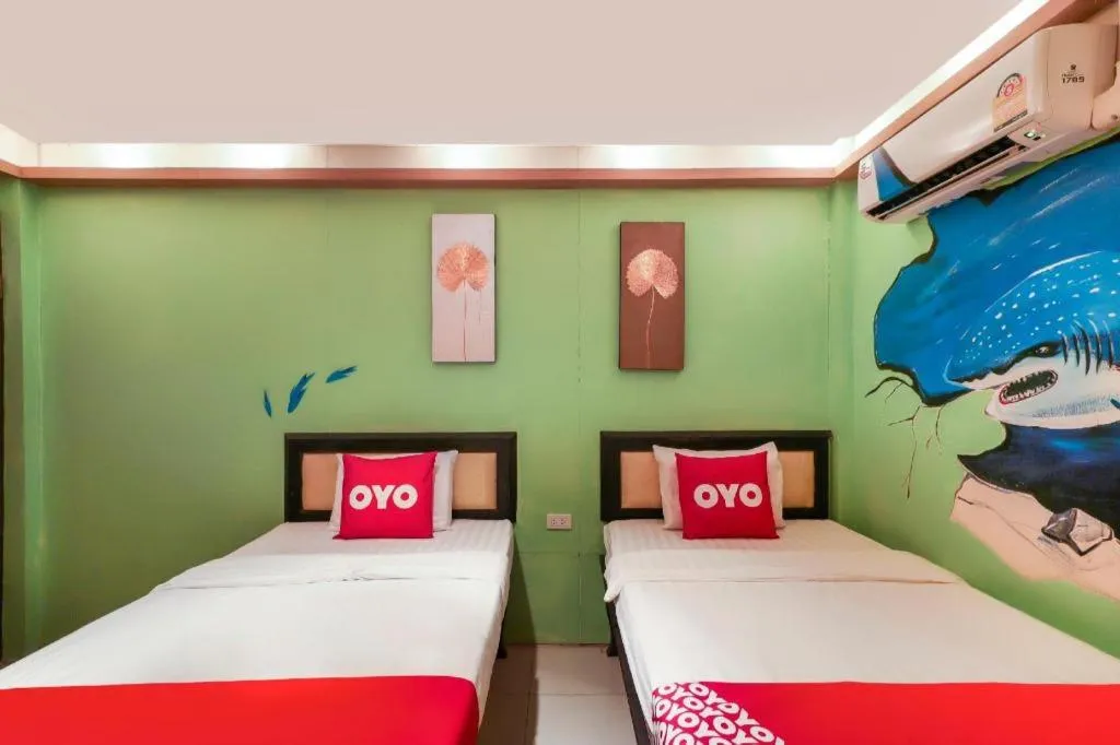 Bed in OYO 768 First Station Hotel