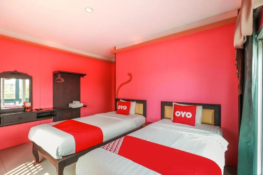 Bed in OYO 768 First Station Hotel