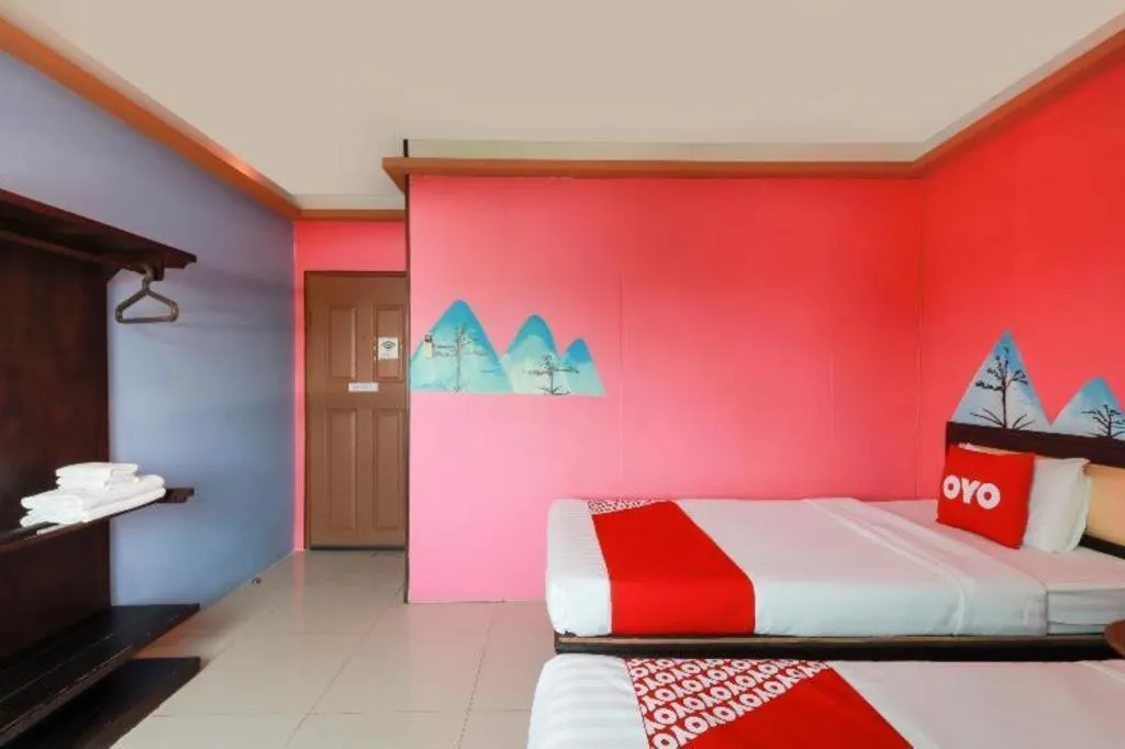 Bed in OYO 768 First Station Hotel