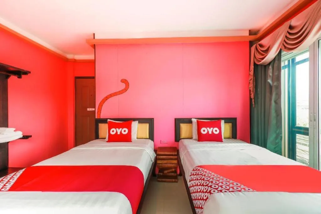 Bed in OYO 768 First Station Hotel