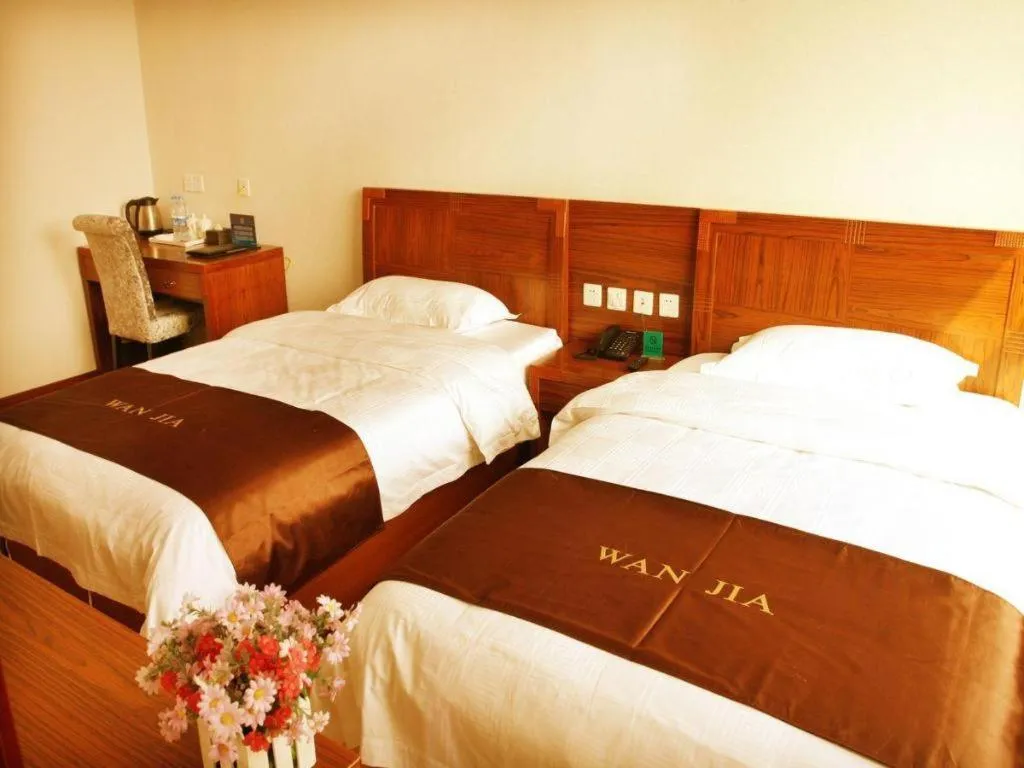 Bed in Beijing Wanjia Traders Hotel