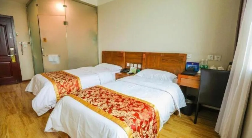 Bed in Beijing Wanjia Traders Hotel