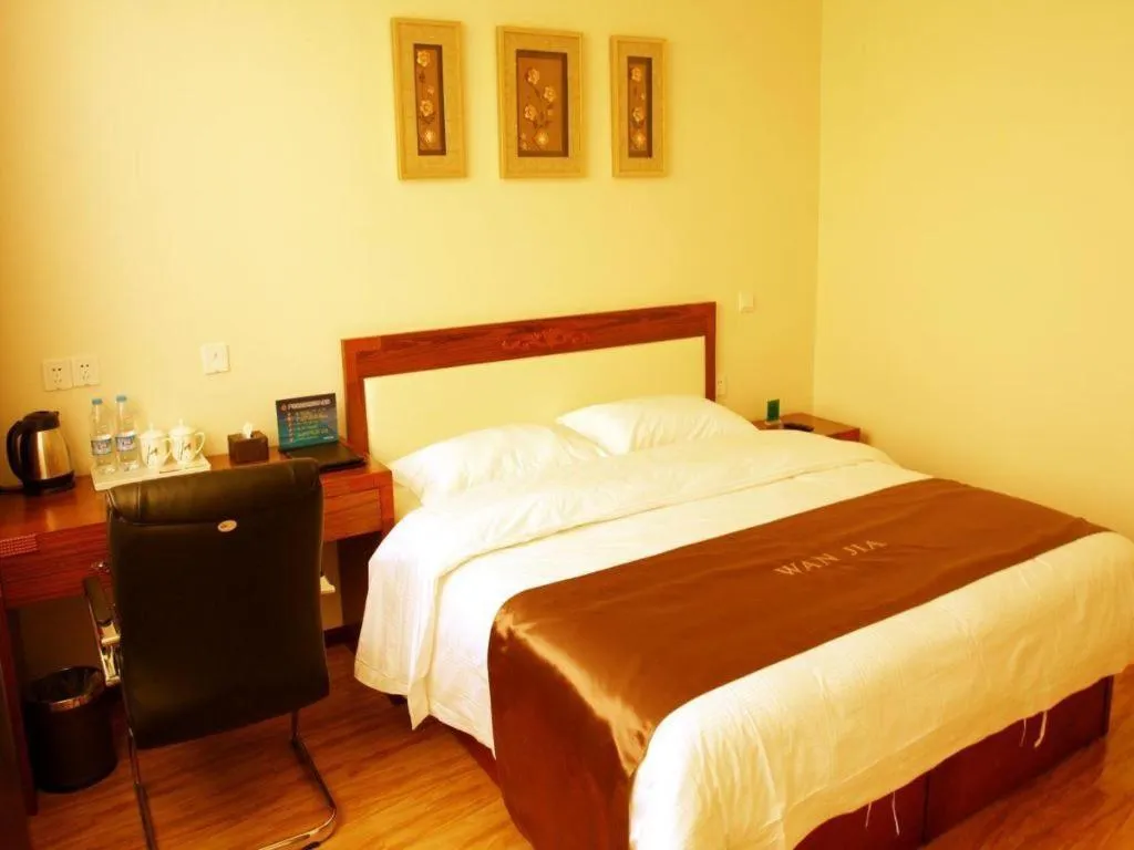 Bed in Beijing Wanjia Traders Hotel