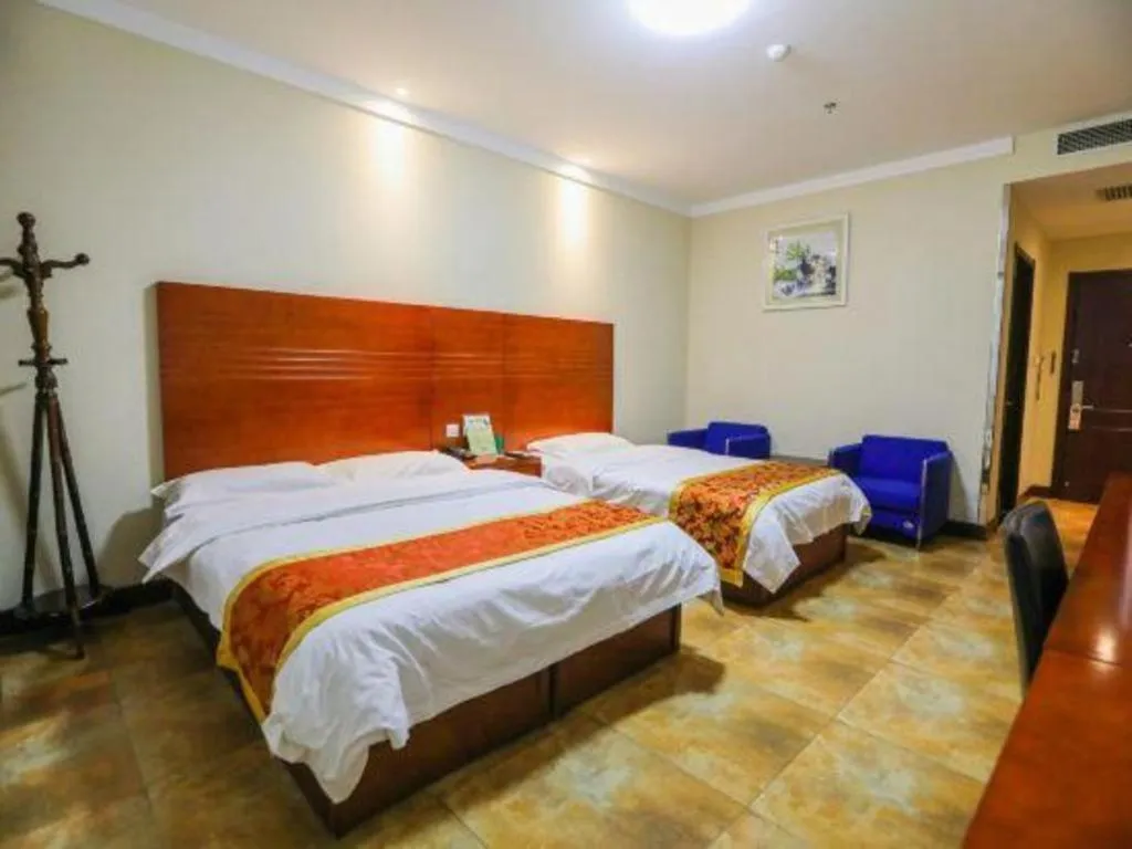 Bed in Beijing Wanjia Traders Hotel