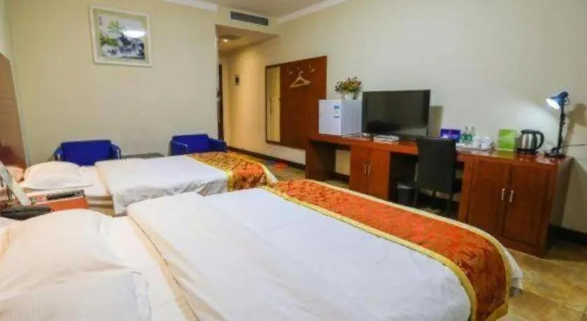 Bed in Beijing Wanjia Traders Hotel