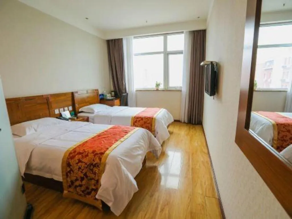 Bed in Beijing Wanjia Traders Hotel