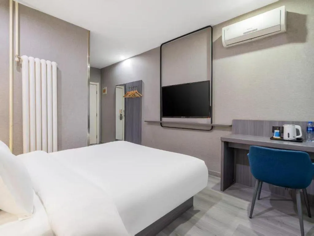 Bed in 7 Days Inn Tianjin Railway Station