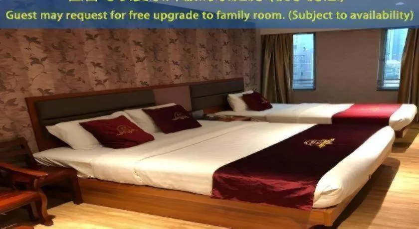 Bed in Metro Winner Hotel