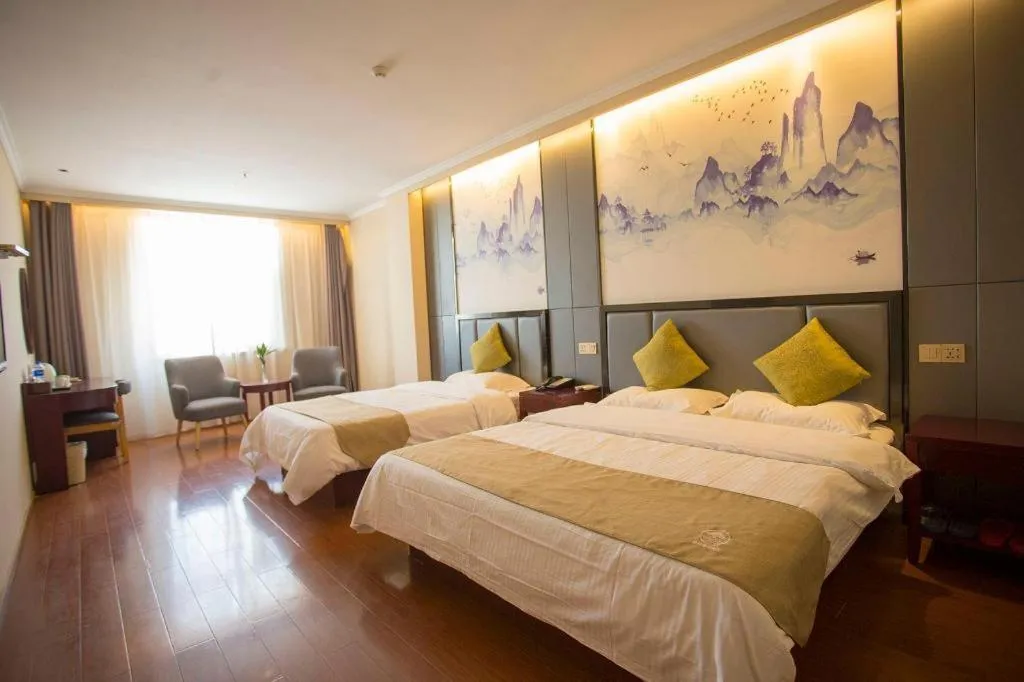 Bed in GreenTree Inn Anhui Fuyang Funan East Huaihe Road Express Hotel