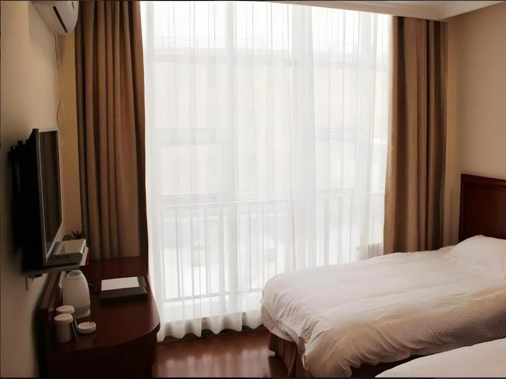 Bed in GreenTree Inn Anhui Fuyang Funan East Huaihe Road Express Hotel