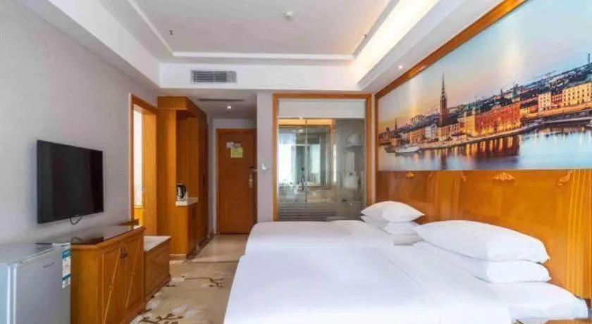 Bed in Vienna Hotel Guangzhou Luochongwei Bus Station Branch