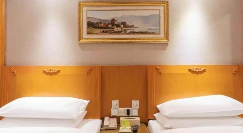 Bed in Vienna Hotel Guangzhou Luochongwei Bus Station Branch